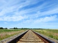 Train rails in summer field, Lithuania Royalty Free Stock Photo