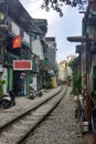 Train rails in a narrow alley in Hanoi - Vietnam