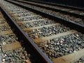Train railway tracks filled with small rocks and stones Royalty Free Stock Photo