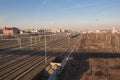 Train on railways with typical buildings and muontains on background. Lingotto district. Turin. Italy. Royalty Free Stock Photo