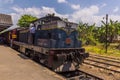 A train at Rambukkana Station on the Kandy to Col0mbo mainline railway in Sri Lanka, Asia