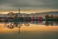 Train refelection autumn sunset landscape in Romania Royalty Free Stock Photo