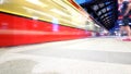 train running throug a station mit motion blurr Royalty Free Stock Photo