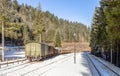 Train. Rusty. Snow. Winter. Station. Forest. Hills Royalty Free Stock Photo
