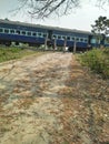 A train s passing in it& x27;s track through a village in Assam