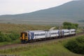 Train on Settle to Carlisle railway, Blea Moor Royalty Free Stock Photo