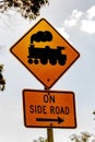 Train on side road - Australian signs found along the road Royalty Free Stock Photo