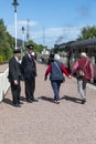 Train staff and passengers Aviemore station Strathspey Railway Scotland