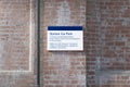 Train station car park sign brick wall railway facilities