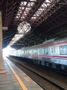 The train at the station in the center of Jakarta is dropping off and picking up passengers