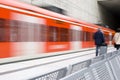 Train station, moving train