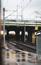 Train station rainy day with electric pole