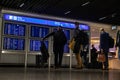 Train station terminal in Brussels Midi Station, passengers and travelers gather affront of info screen Royalty Free Stock Photo