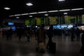 Train station terminal in Brussels Midi Station, passengers and travelers gather affront of info screen Royalty Free Stock Photo