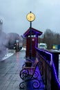 Train station in winter.clock platform modern retro