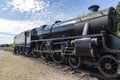 Train stoker and Steam locomotive Aviemore Scotland Royalty Free Stock Photo