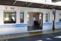 The train stopping at Hinode station in Tokyo, Japan