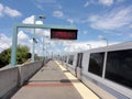 Train stops in West Oakland BART Station Royalty Free Stock Photo