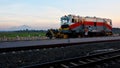 Train in Sunset Time with Merbabu Mountain Royalty Free Stock Photo