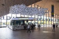 Train tourist information stand inside large modern railway station