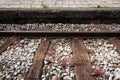 Train track with platform and red grass on them