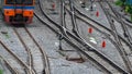 Train track and traffic sign between railway. Journey by train. Local transportation. Travel on summer by train. Junction Royalty Free Stock Photo