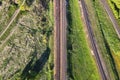 Train tracks with grass and trees, top view. Aerial view of railways Royalty Free Stock Photo