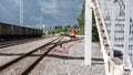 Train on the tracks. The locomotive pulls a train of freight cars filled with cargo. Shunting diesel locomotive works at the stati