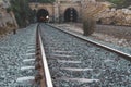 Train tracks and tunnel background with light reflections