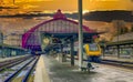 A train traveling down train tracks near Antwerp central station Royalty Free Stock Photo