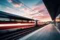 A train traveling past a train station. Blur effect from a fast moving train.Selective focus. High-speed transport