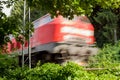 The urban transport train runs part of the route on the outskirts of the city of Munich, Fast. Royalty Free Stock Photo