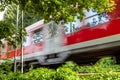 The urban transport train runs part of the route on the outskirts of the city of Munich, germany. Royalty Free Stock Photo