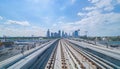 Train view on railway in Dubai Downtown at financial district, skyscraper buildings in urban city, UAE. Transportation for Royalty Free Stock Photo