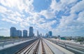 Train view on railway in Dubai Downtown at financial district, skyscraper buildings in urban city, UAE. Transportation for Royalty Free Stock Photo