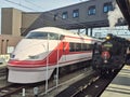 Modern Train and Steam Train in Japan. Royalty Free Stock Photo