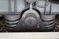 Train wheel close-up with large spring Royalty Free Stock Photo