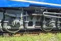 Train wheels on rail track. Wheels of a railway train on rails close up Royalty Free Stock Photo