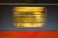 Train window in movement with people