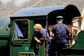 Train workers on Steam Locomotive footplate.