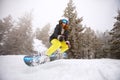 Trained woman snowboarding Royalty Free Stock Photo