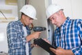 Trainee electrician learning their trade Royalty Free Stock Photo