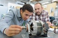 trainee engineer setting up rotor