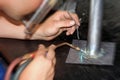Trainee plumber soldering Royalty Free Stock Photo