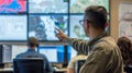 Trainees using a virtual command center to coordinate their response to a largescale natural disaster simulation Royalty Free Stock Photo