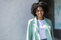 Happy pretty young black woman employee posing outdoor Royalty Free Stock Photo