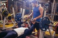 Trainer helping man on bench press Royalty Free Stock Photo