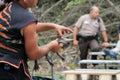 Trainer holding Baby alligator