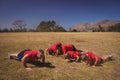 Trainer instructing kids while exercising in the boot camp Royalty Free Stock Photo