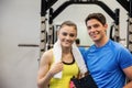 Trainer and woman discussing workout plan Royalty Free Stock Photo